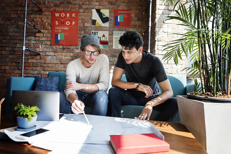Two designers collaborating on a project